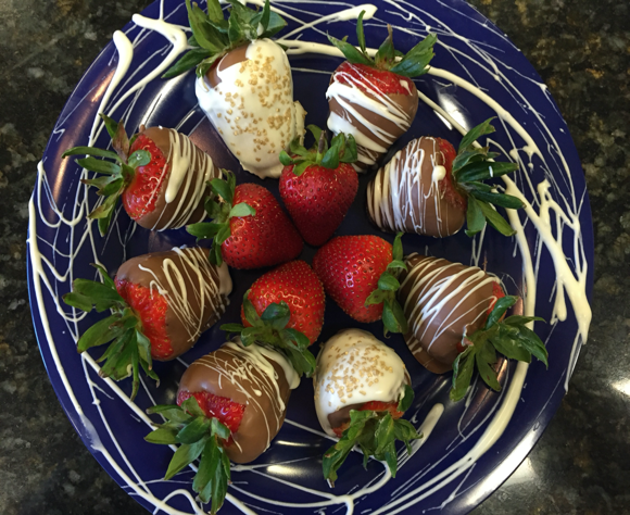 View of a delishious plate of chocolate covered strawberries