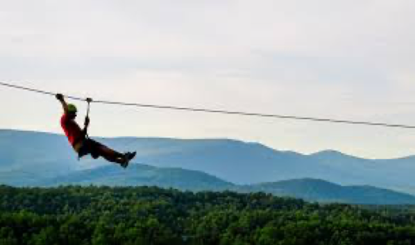 zip line with mountains in background