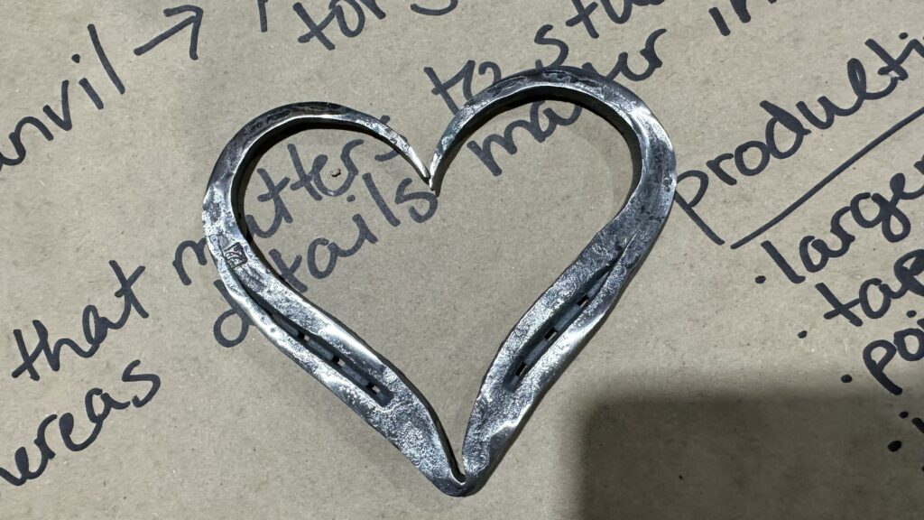 Image of a metal heart forged at the Drunken Smithy