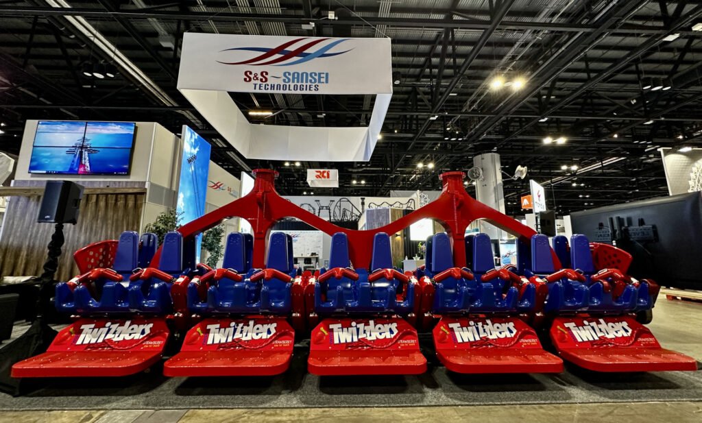 Photo of the Twizzlers Twisted Gravity swing seat at the International Association of Amusement Parks and Attractions