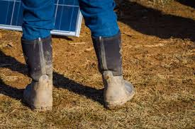 Image of Muddy boots from an Amish Mud Sale.